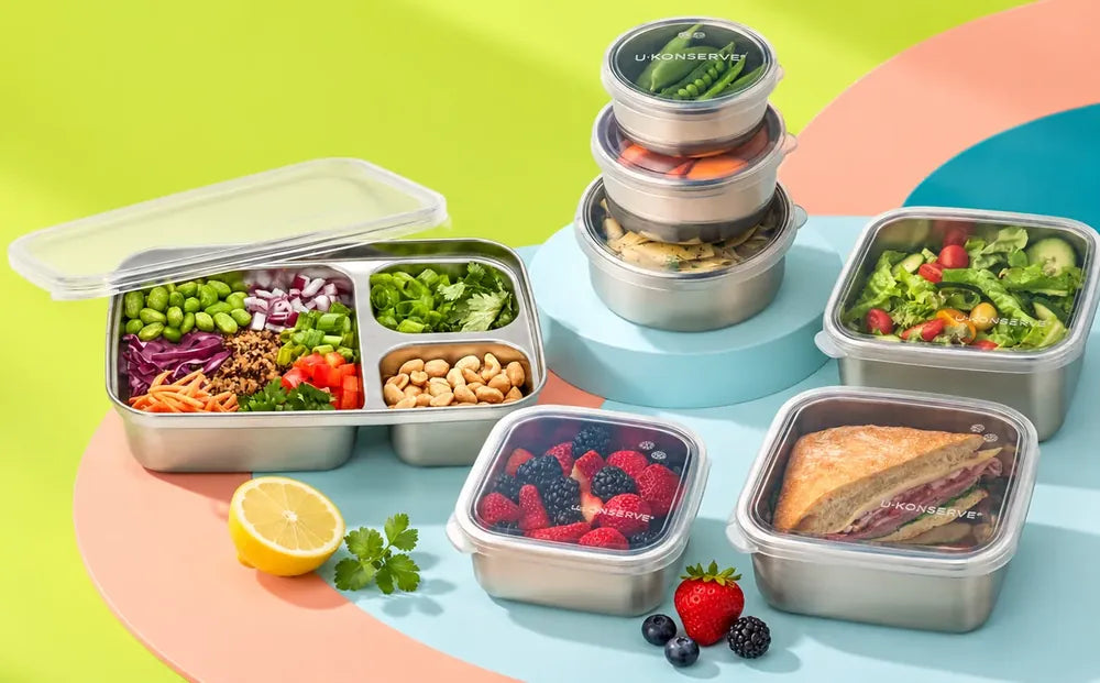 U-Konserve stainless steel containers packed with fresh fruit, salad and snacks